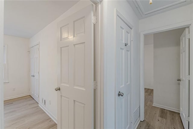 hallway featuring light hardwood / wood-style floors