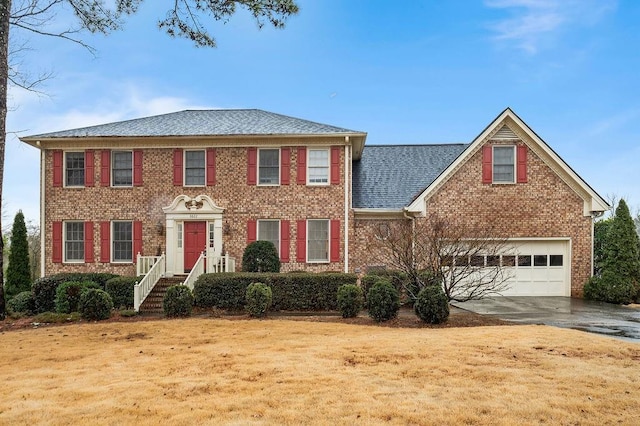 colonial home featuring a garage