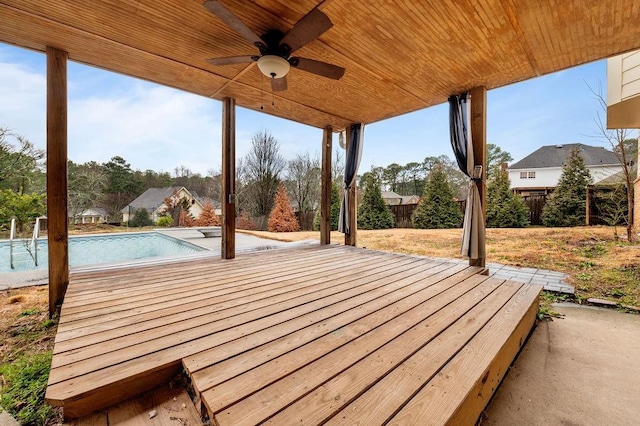 exterior space featuring ceiling fan