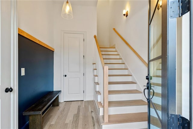 staircase featuring hardwood / wood-style floors