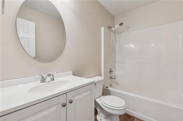 4958 Alpine Ct, Winston, GA 30187 - bathroom with toilet, vanity, shower / tub combination, and wood finished floors