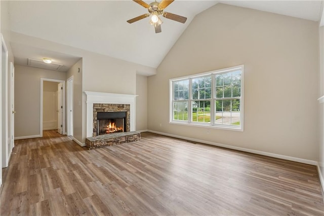 4958 Alpine Ct, Winston, GA 30187 - unfurnished living room with high vaulted ceiling, ceiling fan, wood finished floors, a fireplace, and baseboards