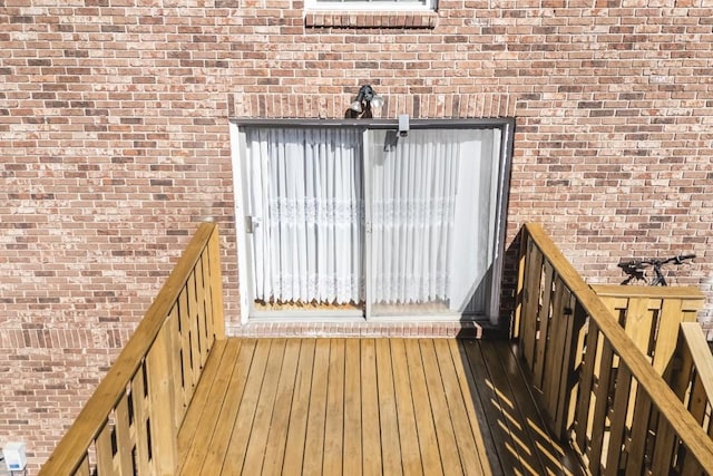 exterior space featuring brick siding