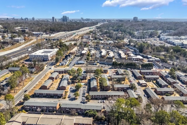 birds eye view of property with a view of city