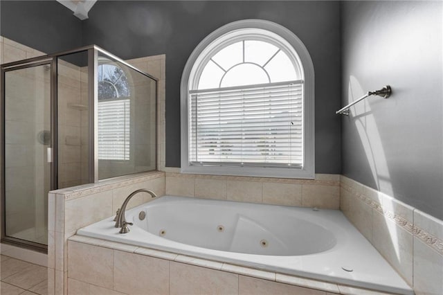 full bath with a stall shower, a whirlpool tub, and tile patterned floors