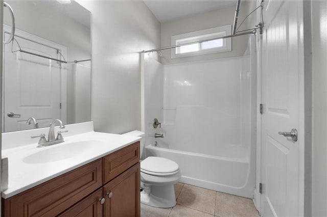 bathroom with toilet, shower / tub combination, vanity, and tile patterned floors