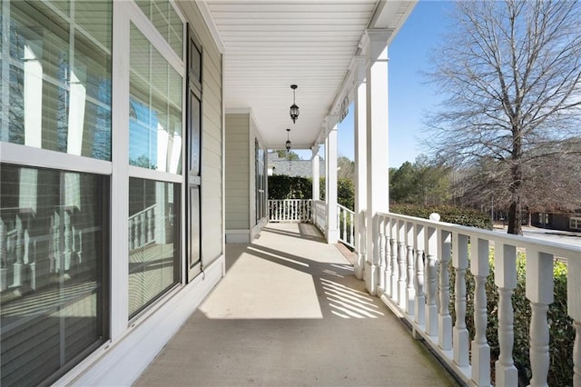 balcony featuring a porch