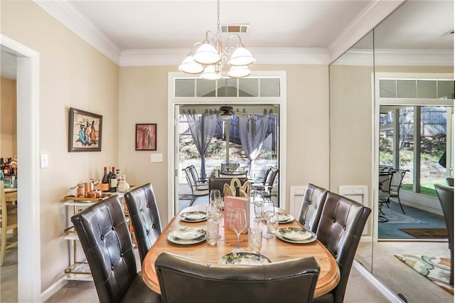 dining space with visible vents, a chandelier, crown molding, light carpet, and french doors