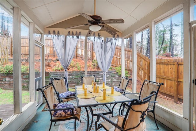 sunroom with a ceiling fan