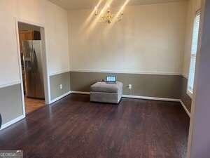 interior space with dark hardwood / wood-style flooring