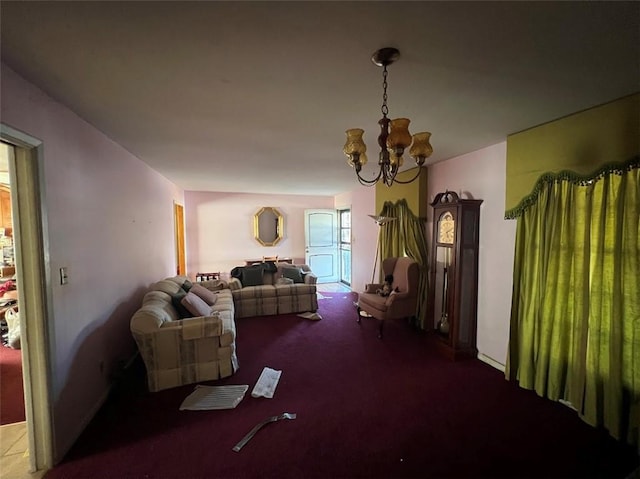 living room featuring carpet floors and a chandelier