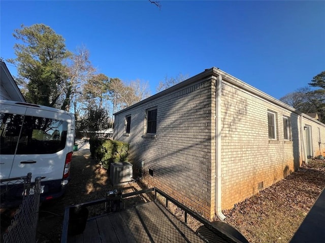 view of home's exterior featuring central AC