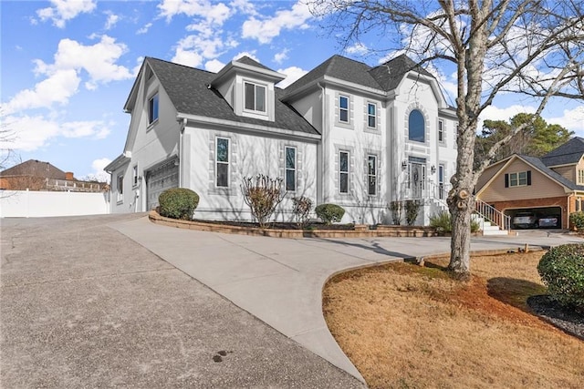 view of front of home with a garage