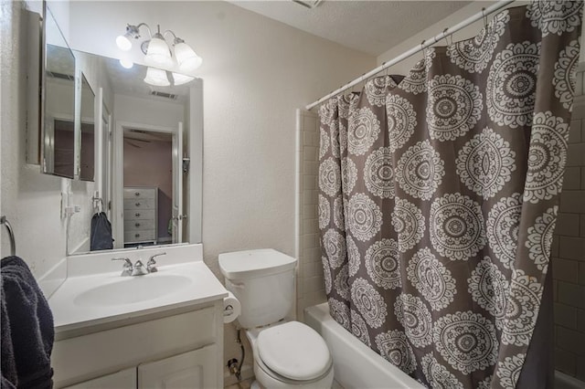 bathroom with shower / bath combination with curtain, visible vents, toilet, vanity, and a textured ceiling