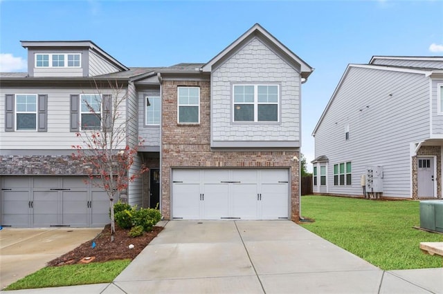2231 Bedell Dr, Conyers, GA 30094 - view of front facade featuring driveway, a front lawn, an attached garage, and brick siding