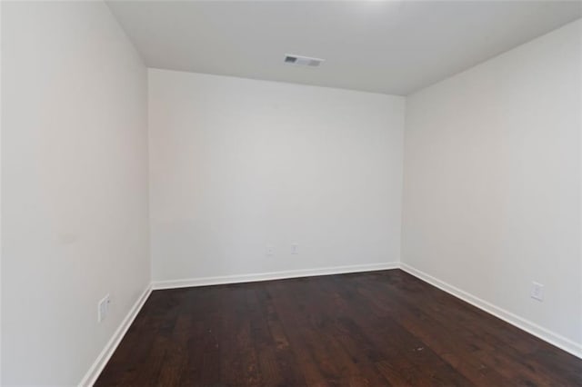 2231 Bedell Dr, Conyers, GA 30094 - unfurnished room with wood finished floors and baseboards