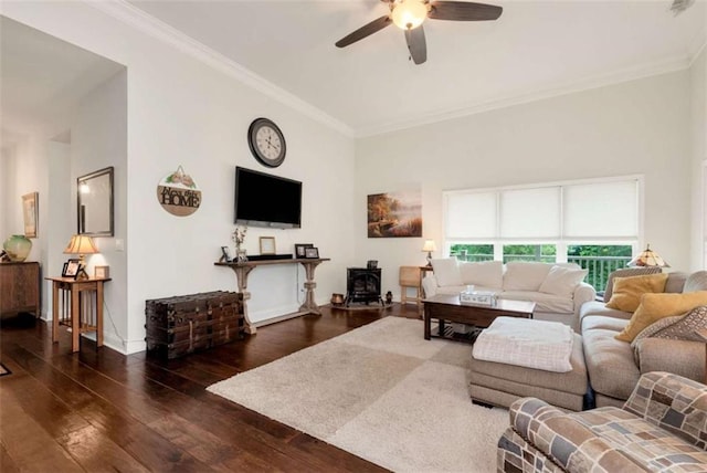 806 Skelton Rd, Hoschton, GA 30548 - living room with a wood stove, hardwood / wood-style flooring, ceiling fan, and crown molding
