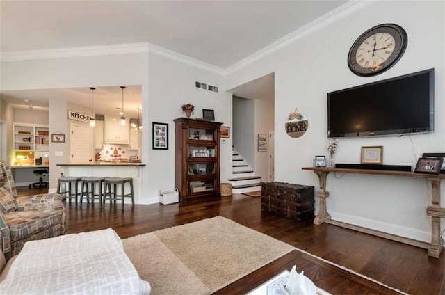 806 Skelton Rd, Hoschton, GA 30548 - living area with ornamental molding, wood finished floors, and stairway