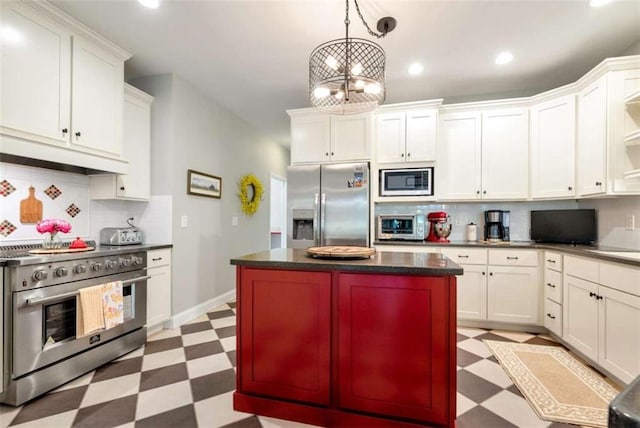 806 Skelton Rd, Hoschton, GA 30548 - kitchen featuring stainless steel appliances, light floors, dark countertops, tasteful backsplash, and white cabinets