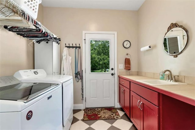 806 Skelton Rd, Hoschton, GA 30548 - laundry area with washing machine and clothes dryer, light flooring, and cabinet space