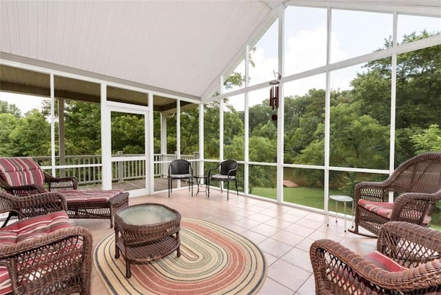 806 Skelton Rd, Hoschton, GA 30548 - sunroom with healthy amount of natural light, view of scattered trees, and vaulted ceiling