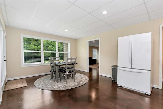 806 Skelton Rd, Hoschton, GA 30548 - dining area featuring a paneled ceiling and finished concrete floors
