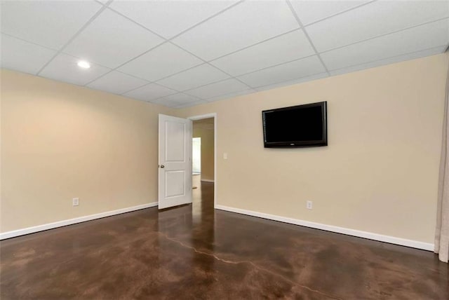 806 Skelton Rd, Hoschton, GA 30548 - empty room with finished concrete floors, a paneled ceiling, and recessed lighting