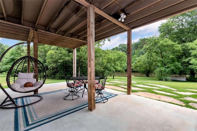 806 Skelton Rd, Hoschton, GA 30548 - view of patio / terrace with view of scattered trees and outdoor dining space