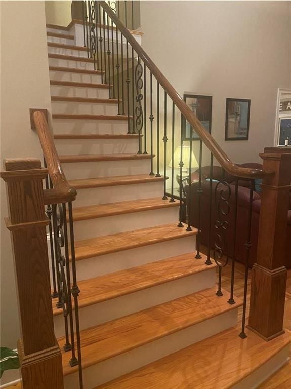 180 Hightower Lake Trl, Ball Ground, GA 30107 - stairs featuring wood finished floors