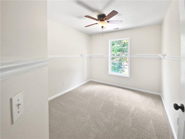 unfurnished room featuring carpet flooring and ceiling fan