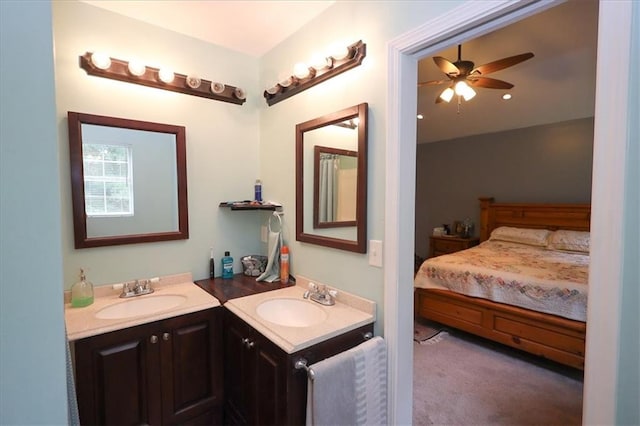 236 Hiram Sudie Rd, Dallas, GA 30157 - ensuite bathroom featuring two vanities and a ceiling fan
