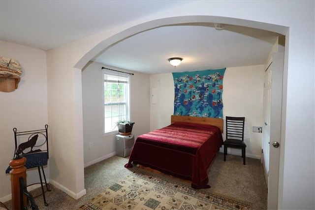236 Hiram Sudie Rd, Dallas, GA 30157 - bedroom featuring arched walkways, light colored carpet, and baseboards