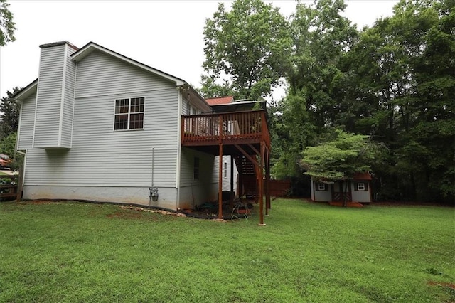 236 Hiram Sudie Rd, Dallas, GA 30157 - rear view of property with a wooden deck, stairs, a yard, and a chimney