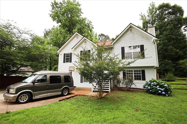 236 Hiram Sudie Rd, Dallas, GA 30157 - view of front of home with a chimney and a front yard