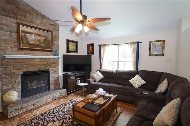 236 Hiram Sudie Rd, Dallas, GA 30157 - living room featuring a ceiling fan, wood finished floors, lofted ceiling, and a fireplace