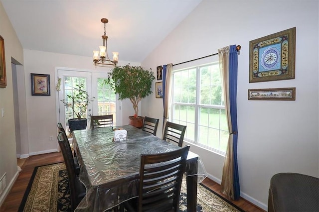 236 Hiram Sudie Rd, Dallas, GA 30157 - dining room with a chandelier, plenty of natural light, vaulted ceiling, baseboards, and dark wood-style floors