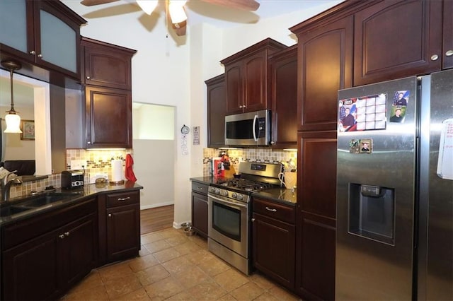 236 Hiram Sudie Rd, Dallas, GA 30157 - kitchen with stainless steel appliances, ceiling fan, a sink, and backsplash