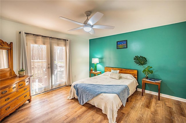 bedroom featuring ceiling fan, access to outside, and light hardwood / wood-style floors