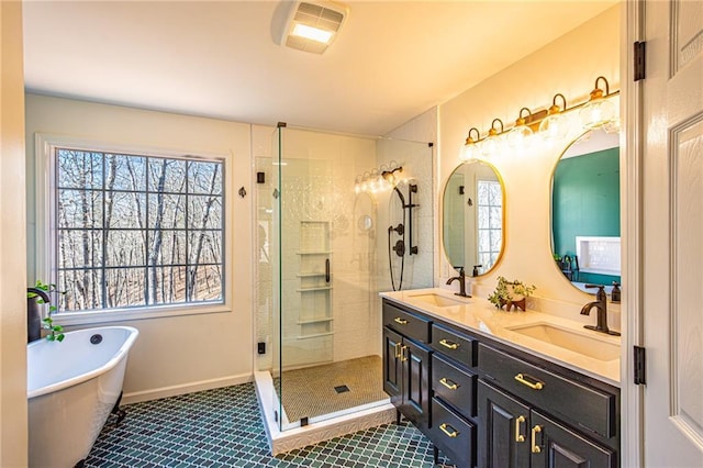 bathroom featuring vanity, separate shower and tub, and tile patterned floors