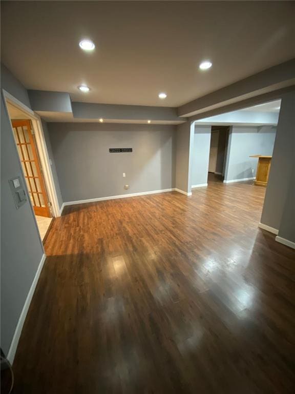 basement featuring hardwood / wood-style flooring