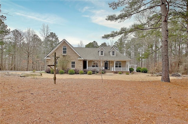 view of front of property featuring covered porch