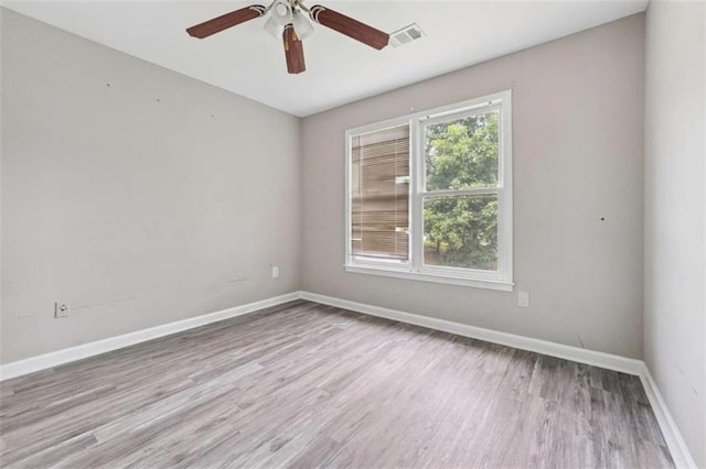 4467 Boatmans Cv, Stone Mountain, GA 30083 - spare room with wood finished floors and a ceiling fan