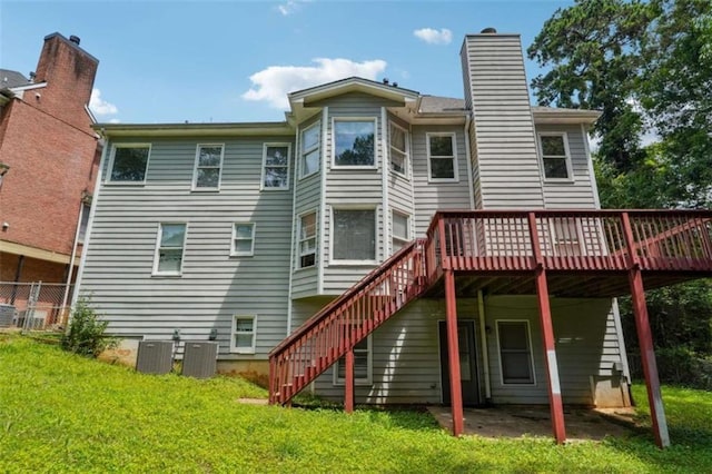 4467 Boatmans Cv, Stone Mountain, GA 30083 - back of house with stairs, a deck, a yard, and a chimney