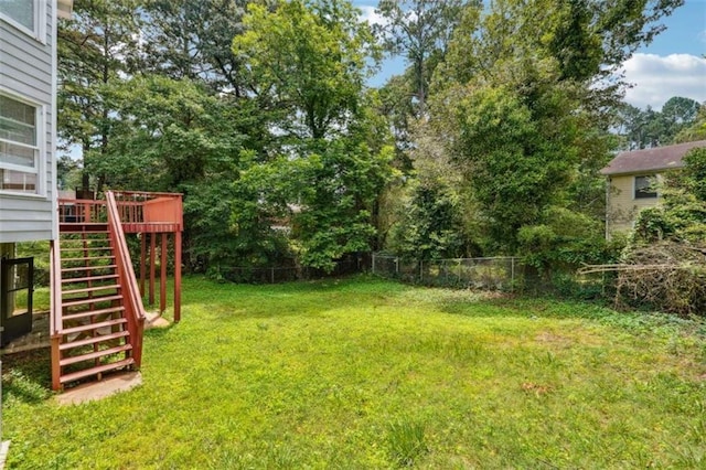 4467 Boatmans Cv, Stone Mountain, GA 30083 - view of yard with stairs and a deck