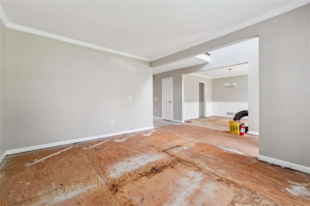 4467 Boatmans Cv, Stone Mountain, GA 30083 - unfurnished room with crown molding and a chandelier