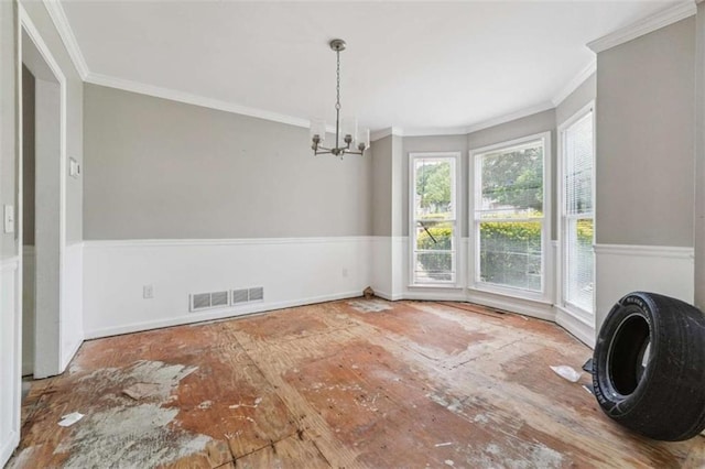 4467 Boatmans Cv, Stone Mountain, GA 30083 - unfurnished dining area featuring a chandelier and ornamental molding