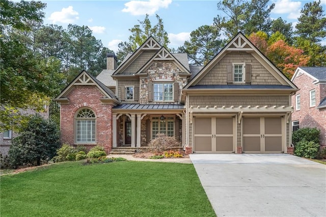 craftsman-style home with a garage and a front lawn