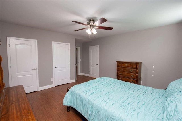 bedroom featuring dark wood-type flooring and ceiling fan