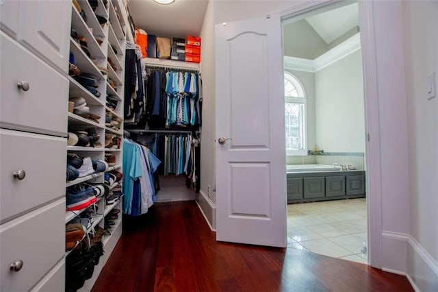 walk in closet with tile patterned floors