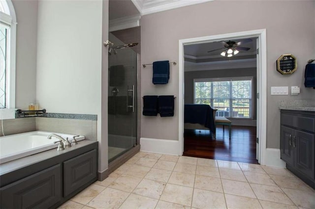 bathroom featuring crown molding, ceiling fan, hardwood / wood-style flooring, and separate shower and tub